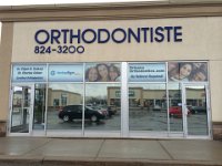 Orleans Orthodontics  Upper window design and installation of blockout vinyl with face adhesive